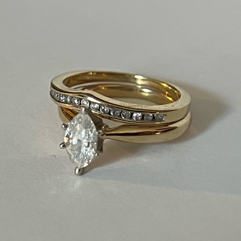 Size 5 marquise wedding set. 1CT diamond, 14KT gold for both rings.